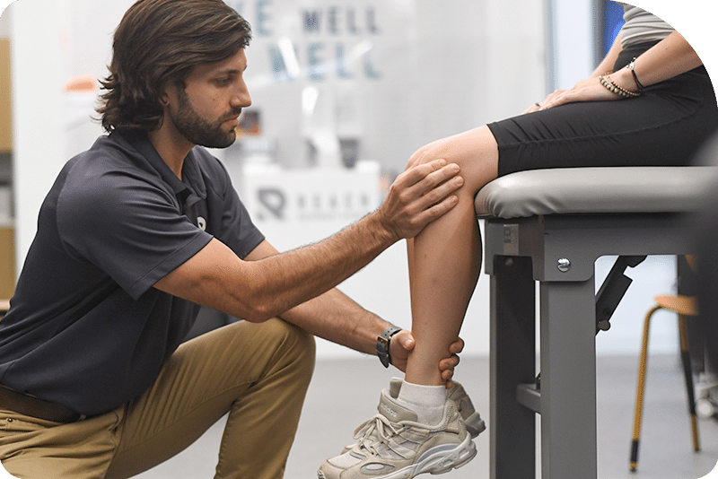 physical therapist treating knee